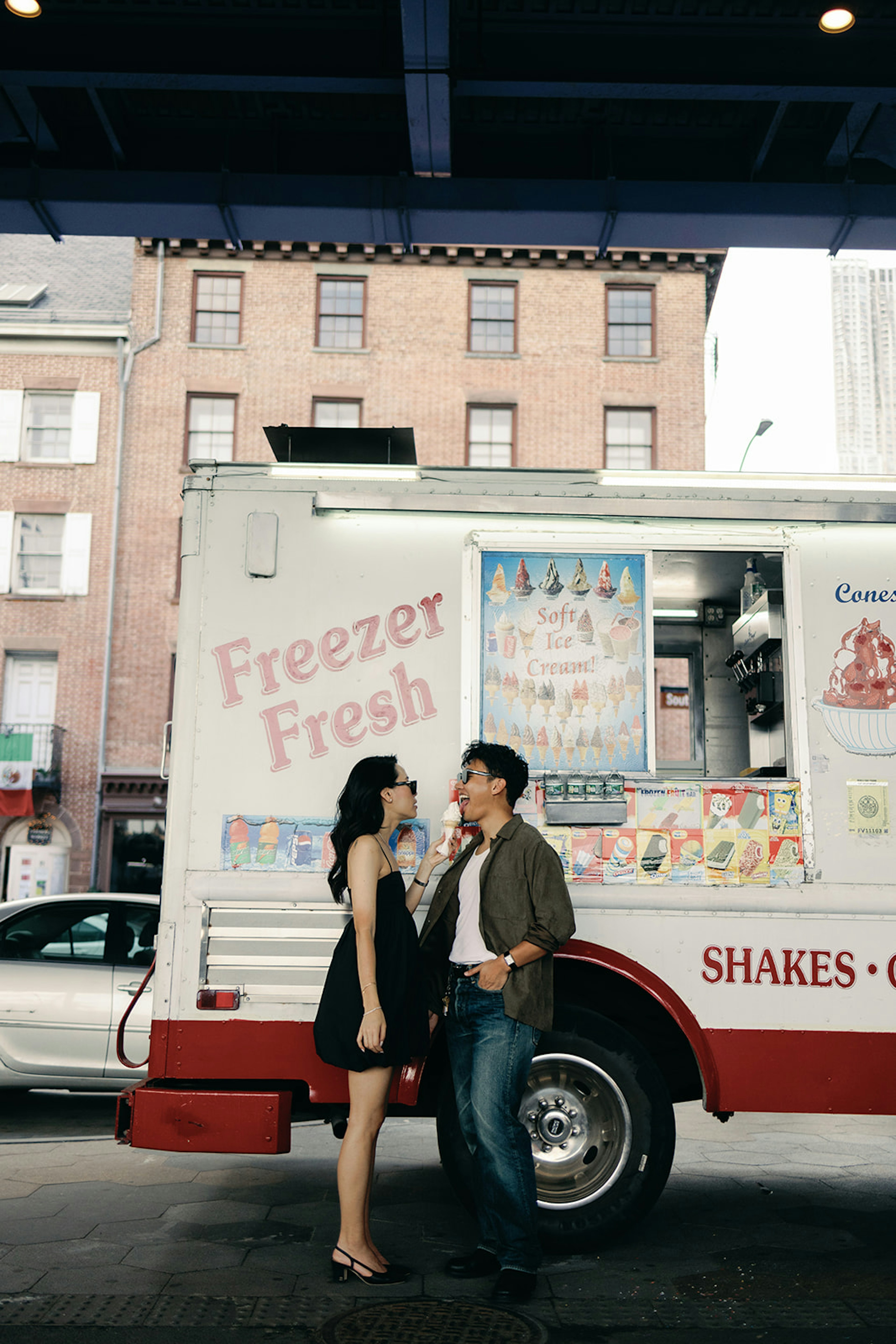 Eating ice cream in front of an ice cream truck